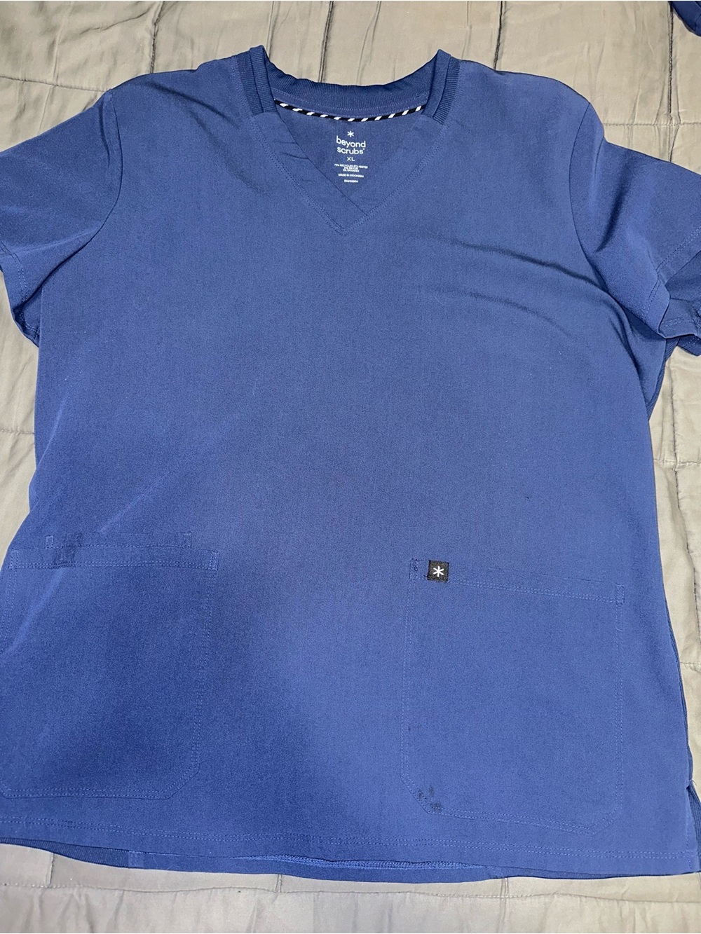 Women’s blue scrub top